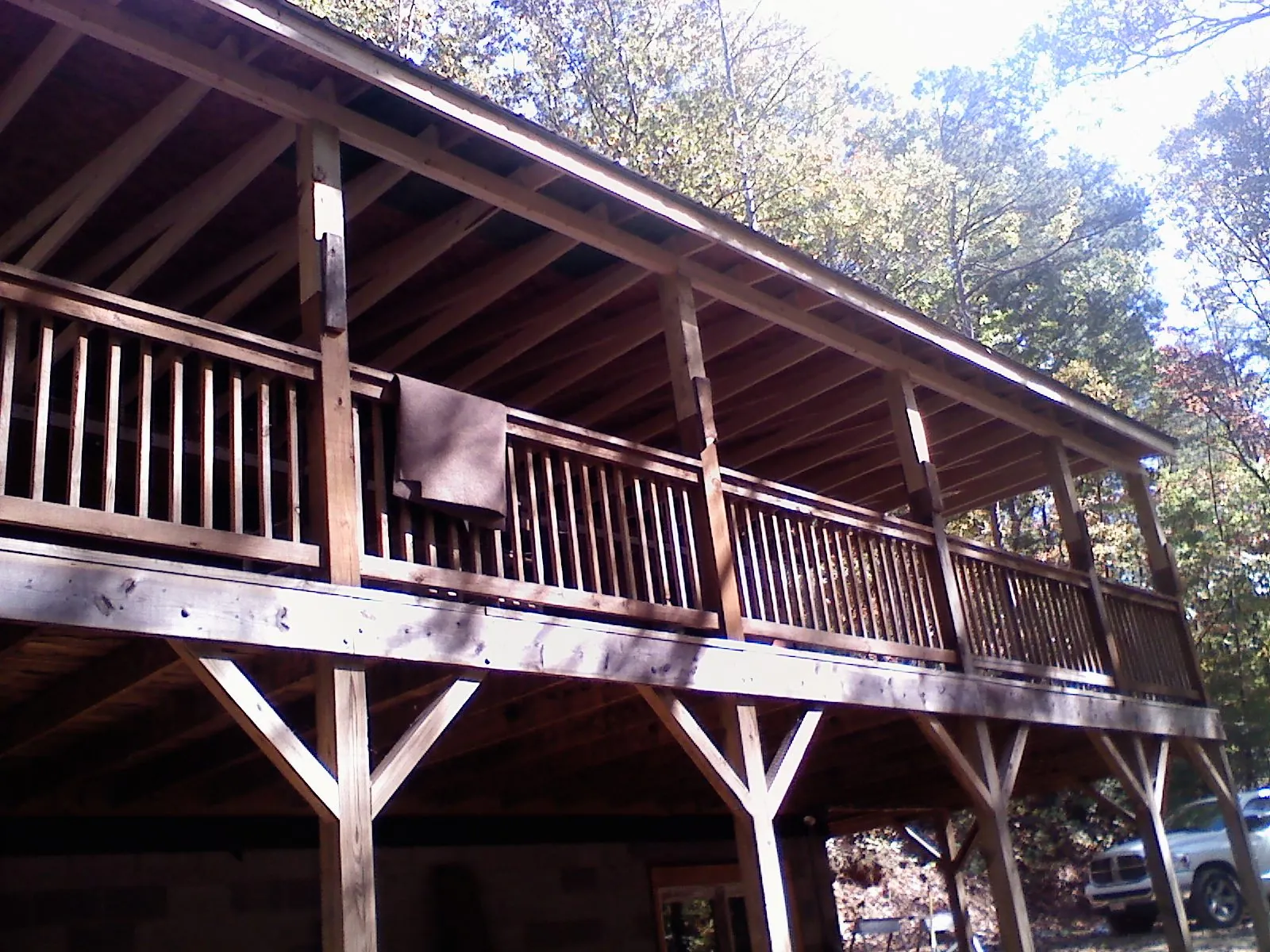 Timber framing under a new elevated porch and deck — Roof Leak Repair in Madison by Roofing Brothers
